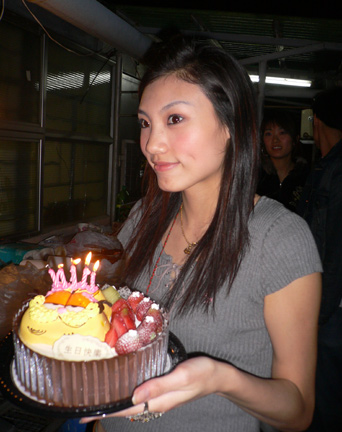 Meeco with her cake