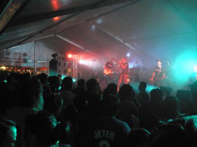 Hardpack performing in the tent.